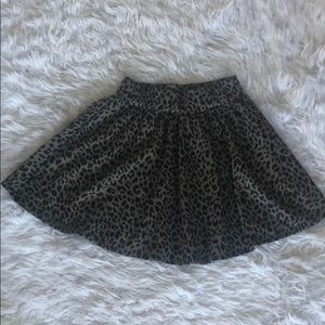 Grey/black cheetah print skirt.